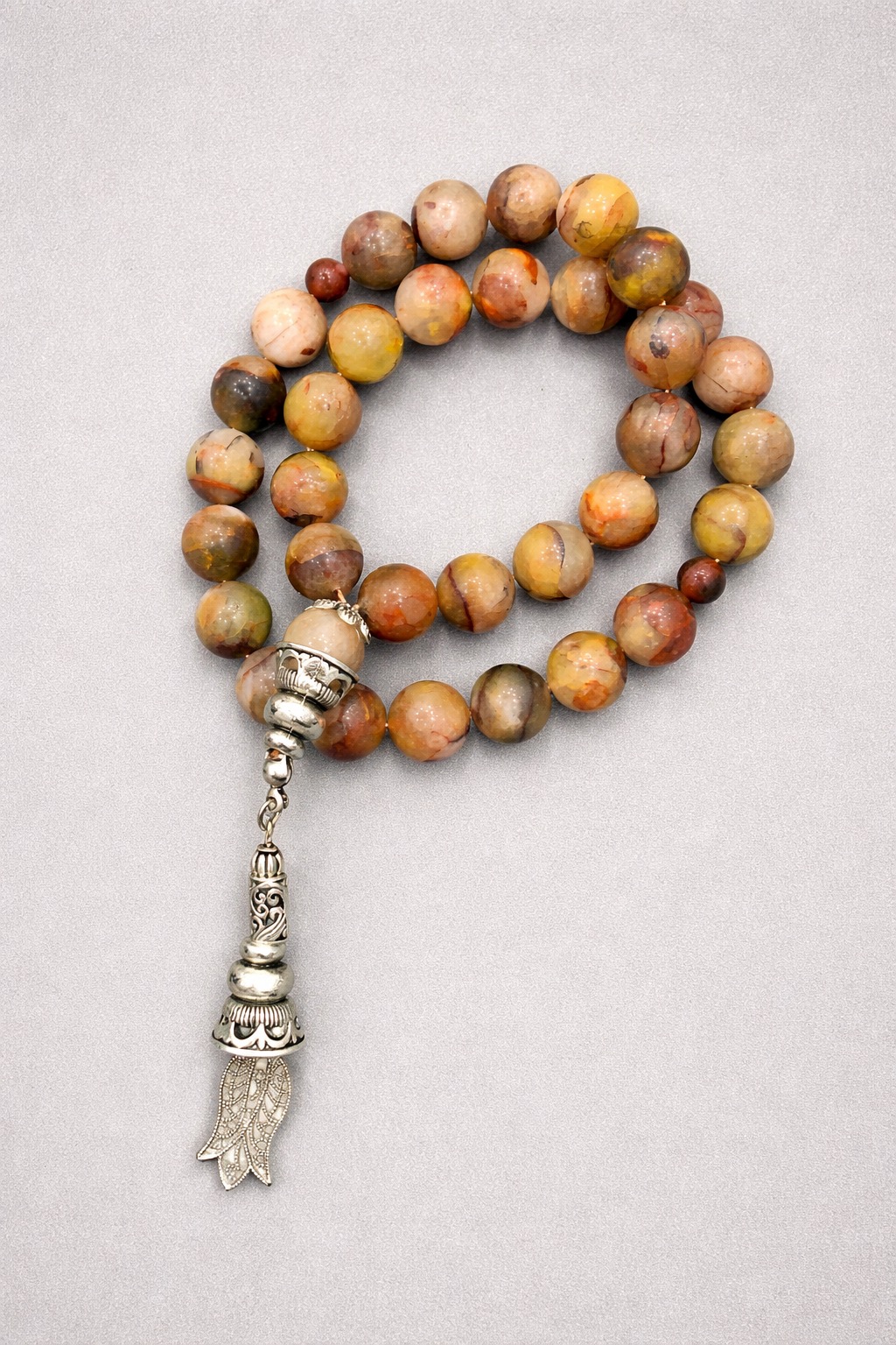 Handcrafted crazy lace agate tasbeeh
